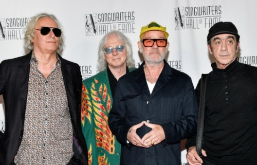 REM reunited and surprised with their classic “Losing My Religion”