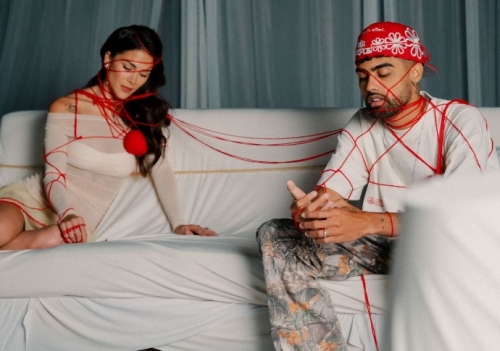 Greeicy and Jay Wheeler look at each other and ask, “What happened to you?”